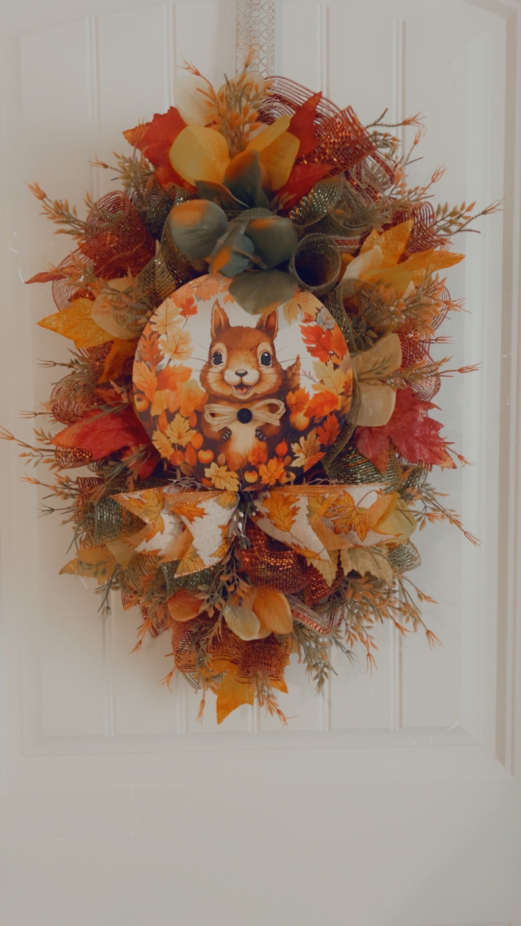 W-062.  Squirrel Swag Door Wreath